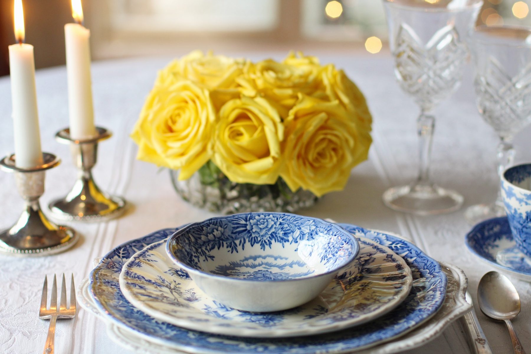 table setting with plates and flowers