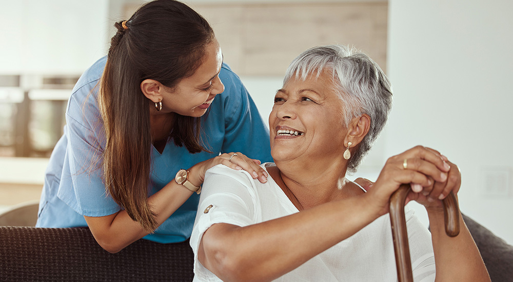 Caregiver looking over client's shoulder