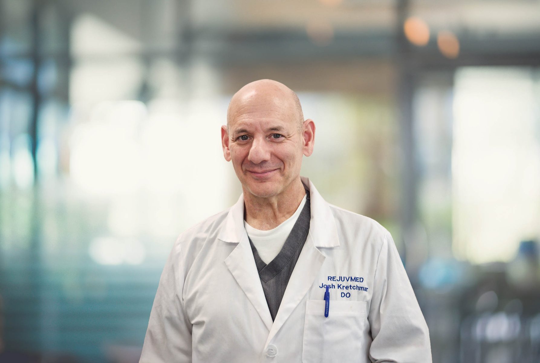 Doctor Josh smiling in doctor coat